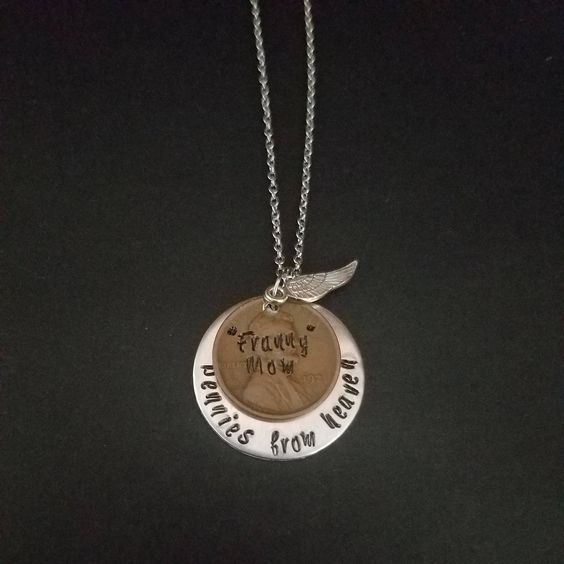 "Hand stamped pennies from heaven necklace on an 18\\" stainless steel chain. Hand stamped by me on a 1\\" aluminum round. Please provide penny year requested if you have a particular year you\'d like. Pennies earlier than 1985(ish) are harder to come by, as I use pennies that I have laying around the house. You can request years prior, but if you do, please leave another year you\'d be okay with me using in case I can\'t find your first choice! This listing is for ONE necklace. Please leave a font c