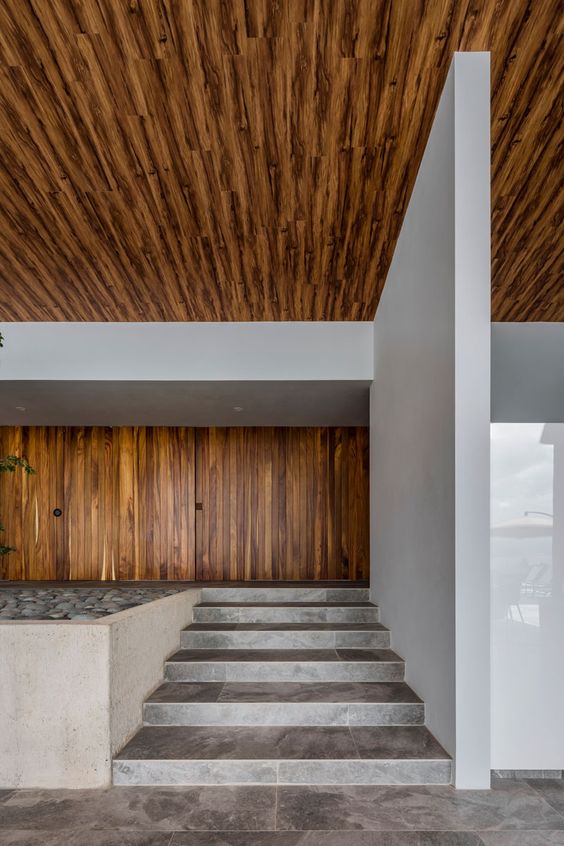 This Home Was Designed With A High Sloping Roof That Allows Large Windows To Capture The Lake Views