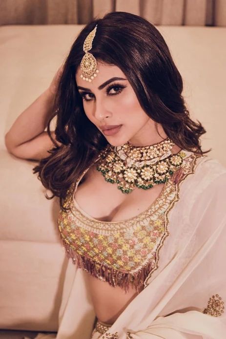 Fashion Faceoff : Mouni Roy’s two looks in White Lehengas