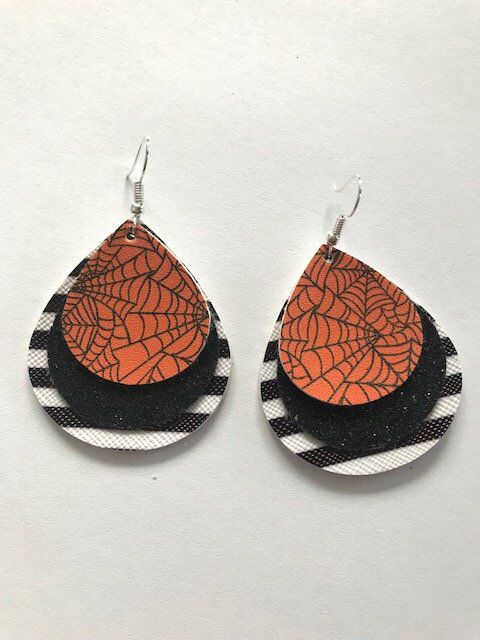 Handmade lightweight leather Halloween earrings with orange glitter