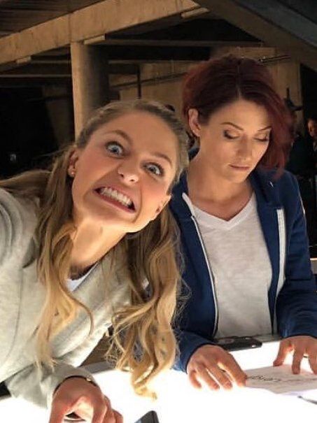 Melissa Benoist seriously studies the script with Chyler Leigh, #Supergirl