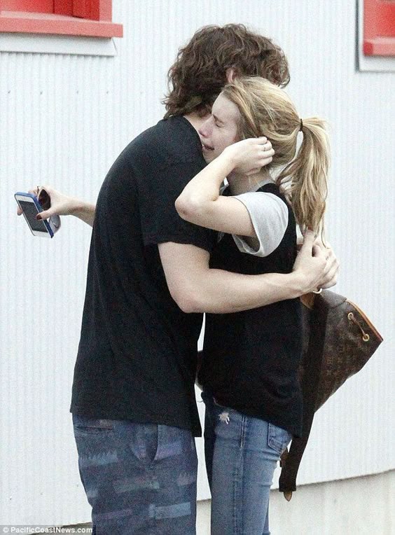 Sobbing Emma Roberts clings to Evan Peters as details emerge of their \'extreme\' relationship in wake of domestic violence arrest