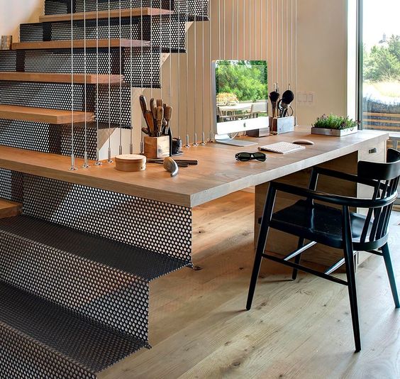A Desk Was Combined With These Stairs To Create A Small Home Office
