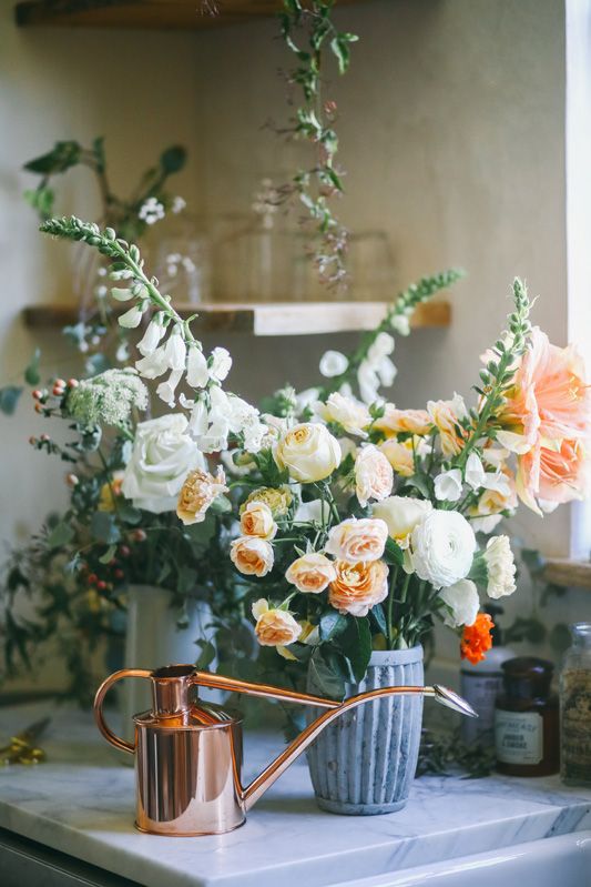 Kitchen decorating ideas with rustic decor and modern farmhouse style. Beautiful floral arrangement by Beth Kirby of Local Milk. #kitchendecor #floral #centerpiece #bethkirby #modernfarmhouse #farmhousekitchen