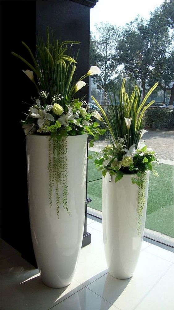 Tall plant pots with lilies #gardenIdeas #garden #gardening #plants #homeDecor #indoor