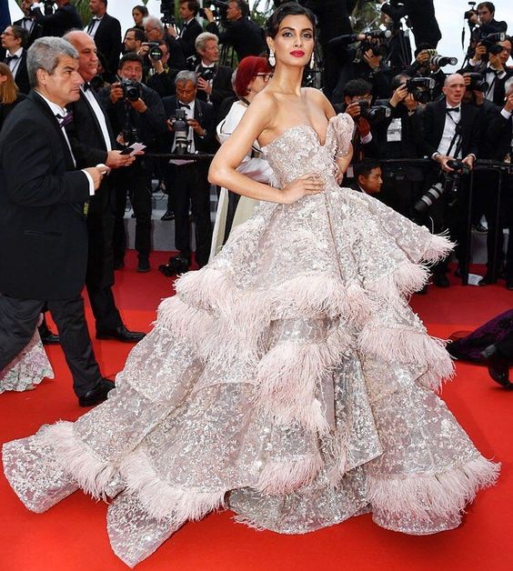 Diana Penty on the red carpet at Cannes. Our #USA dress design firm can easily #replicate #hautecouture #redcarpet #eveningdresses for you in a price range that is affordable. We can use any #couture #designs you #love as inspiration for your #custom #eveninggowns. Custom #fashion #designs start at $1000 and go up from there bassedon intricay & embellishments. Email us at FASHION@DARIUSCORDELL.COM for pricing and more details on a made to order #womensfashion #dress for your special event.
