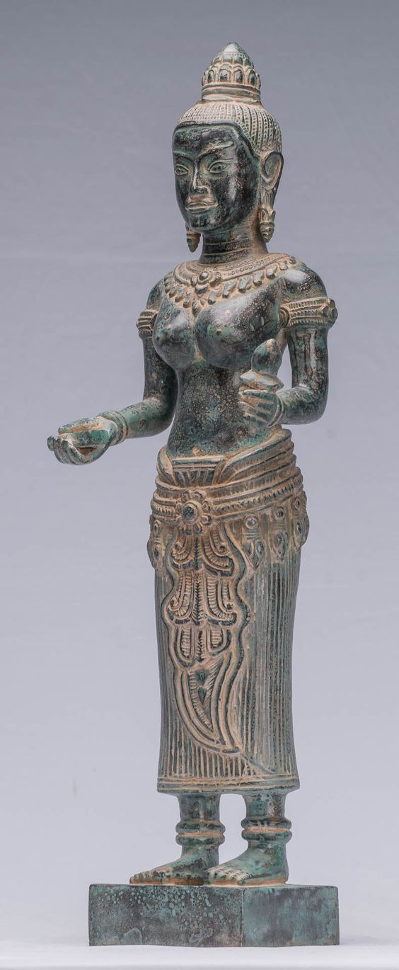 Antique Khmer Style Bronze Lakshmi / Devi Consort of Vishnu Statue - 50cm/20" Measurements H 50cm/20" An antique Khmer style bronze Lakshmi, devi or Goddess sculpture. Lakshmi is the Hindu goddess of wealth, prosperity (both material and spiritual), light, wisdom, fortune, fertility, generosity and courage. The embodiment of beauty, grace and charm. Also called Mahalakshmi, she is said to bring good luck, and is believed to protect her devotees from all kinds of misery and money-related sorrows.