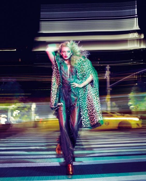 Saint Laurent goat hair cape, £8,460. Temperley London viscose mix Wilde Blouson jumpsuit, £995. Au Jour Le Jour metallic leather boots, £630