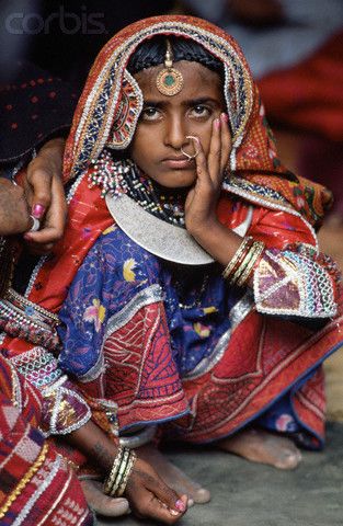 *Rabari Girl at Name Giving Festival. Image credit: Gianni Baldizzone. India