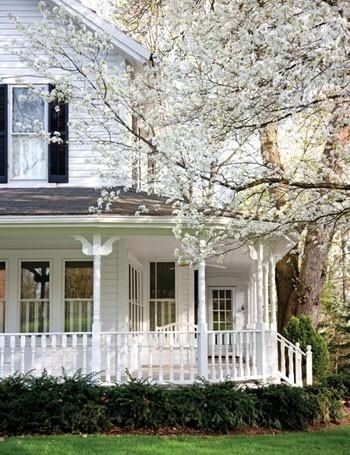 Beautiful house with white porch. I love old classic style homes. Such Character!