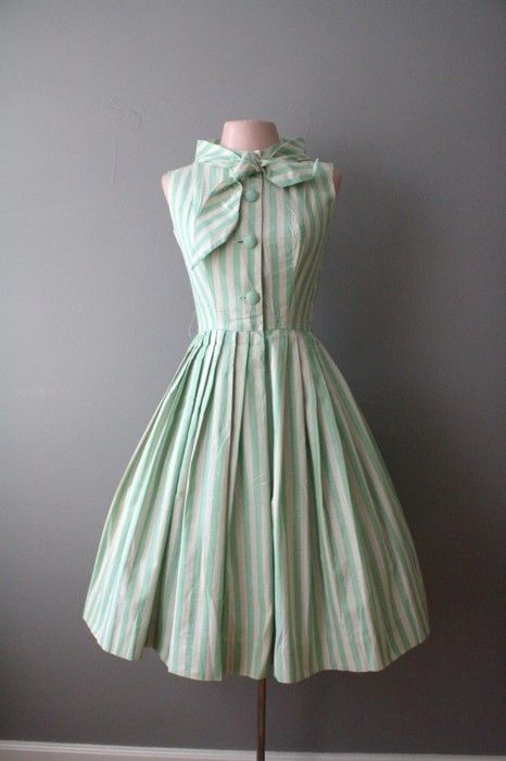 Pinstripe, plus bow, plus full skirt, plus light green, plus button up equals adorable.