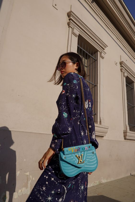 Aimee Song, fashion blogger of Song of Style, shares her favorite print of the moment, galaxy print and how to wear it with the new Louis Vuitton wave bag.