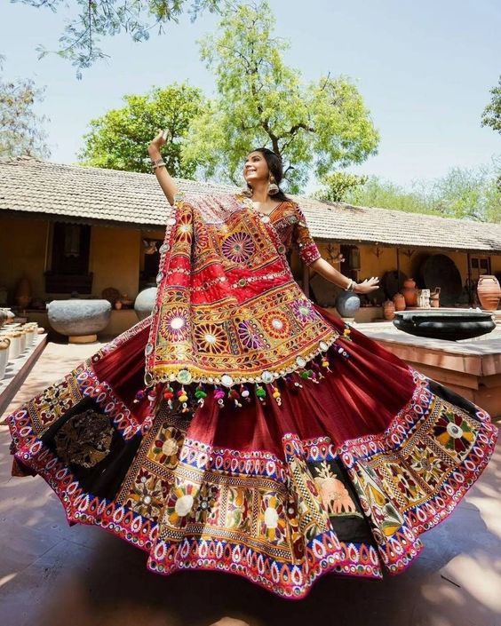 "Navaratri Kinjal Dave Special Silk Lehenga Choli & Dupatta In Digital Print With Glued Real Mirror Work For Women For Garba Event, Navratri. LEHENGA :- (Semi-Stitched) FABRIC :- Heavy Butter Silk LENGTH :-42\\" - 44\\" WORK :- Digital Print Work & REAL MIRROR WORK INNER :- Silk FLAIR :- 4 MTR CHOLI :- (Un-stitched 1.20 Mtr) FABRIC :- Soft Butter Silk WORK :- REAL MIRROR WORK DUPATTA :- (2.20 Mtr) FABRIC :- Heavy Butter Silk WORK :- REAL MIRROR WORK & FANCY LACE BORDER OCCASION : Party wear/Weddin