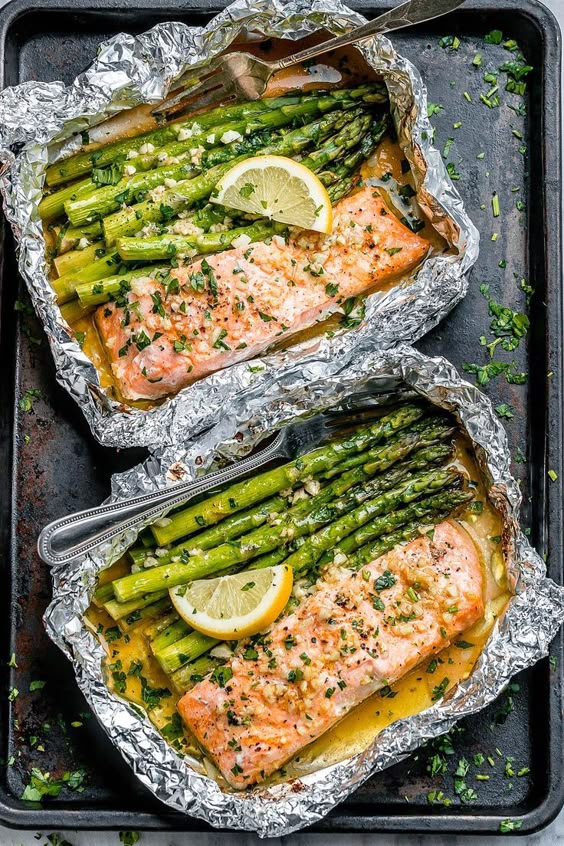 Salmon and Asparagus Foil Packs with Garlic Lemon Butter Sauce – Whip up this quick and delicious salmon recipe tonight! Salmon and asparagus are baked together with a rich buttery sauce in i… Salmon and Asparagus Foil Packs with Garlic Lemon Butter Sauce – Whip up this quick and delicious salmon recipe tonight! Salmon and asparagus are baked together with a rich buttery sauce in i…