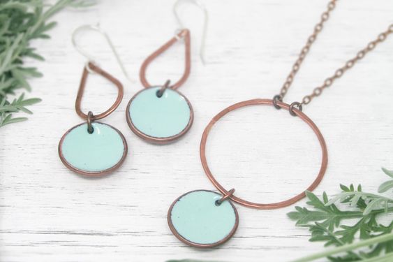 Necklace with enameled penny suspended on large copper ring, on chain.The chain length is adjustable from 16 to 18"Pendant measures 2"Penny jewelry is a great copper anniversary gift.Many buy my enamel penny jewelry as a "pennies from heaven" gift, to remember a loved one.You can order these with a custom date (between 1940 and 1982) buy adding this custom date upgrade here