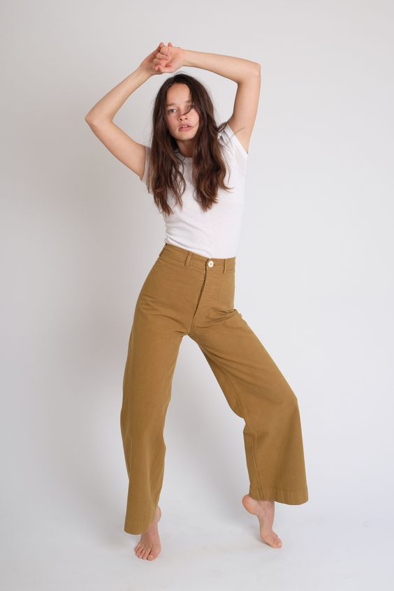 100% FINE COTTON CANVAS IN THE PERFECT KHAKI/ TOBACCO COLOR. REGARDING FIT. THESE PANTS RUN SLIM IN THE HIPS. IF YOU HAVE A LARGER CABOOSE, AND ARE BETWEEN SIZES, WE SUGGEST GOING UP IN SIZE. A TAILOR CAN EASILY TAKE IN THE WAIST. YOU WANT THE TUSH TO FIT... NOT TOO TIGHT, BUT JUST RIGHT. TO FIND