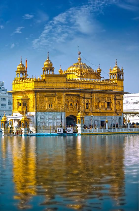 Photo about The The Golden Temple is the holiest shrine in Sikhism. It is located in the Amritsar, India. Image of minaret, architecture, amritsar - 54873749