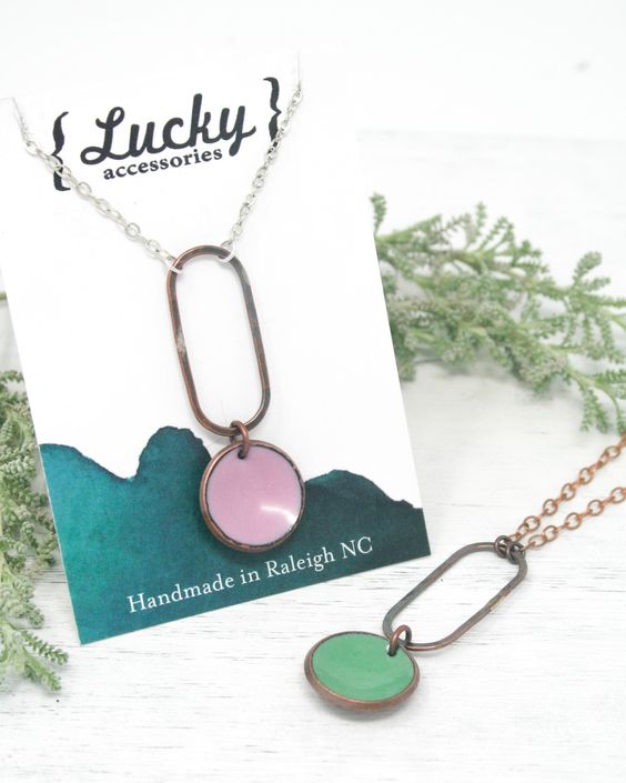 Necklace with enameled penny suspended on a blackened copper oval on the chain. The chain length is adjustable from 16 to 18"Pendant measures 2"Penny jewelry is a great copper anniversary gift.Many buy my enamel penny jewelry as a "pennies from heaven" gift, to remember a loved one.You can order these with a custom date (between 1940 and 1982) buy adding this custom date upgrade here