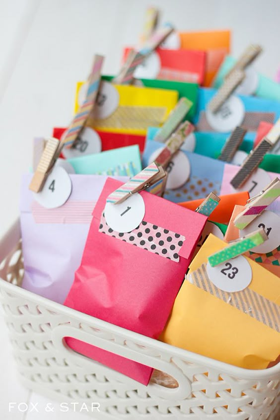 colorful bags with clothespins in basket