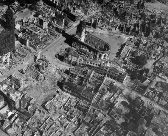 Aerial view of a bomb-damaged churches among the buildings in the center of Worms, Germany, 1945.