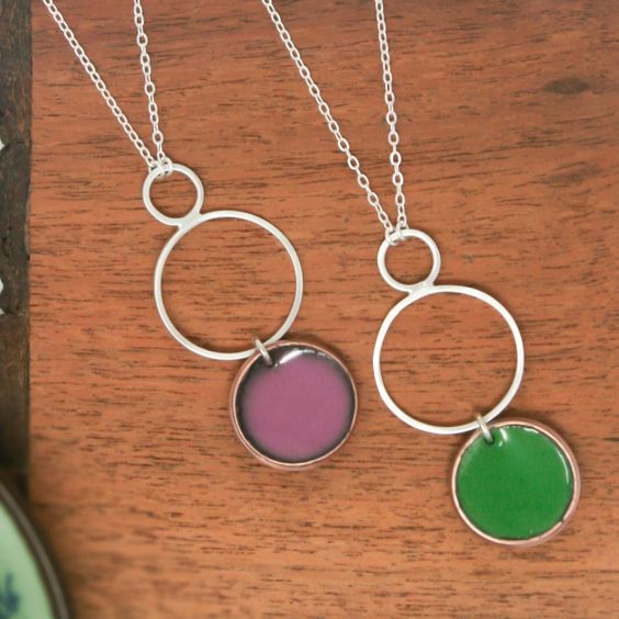 Necklace with enameled penny suspended from sterling silver rings. The chain length is adjustable from 16 to 18"Pendant measures 2"Penny jewelry is a great copper anniversary gift.Many buy my enamel penny jewelry as a "pennies from heaven" gift, to remember a loved one.You can order these with a custom date (between 1940 and 1982) buy adding this custom date upgrade here