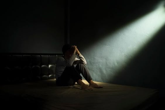 Premium Photo | Sad man in the dark room
