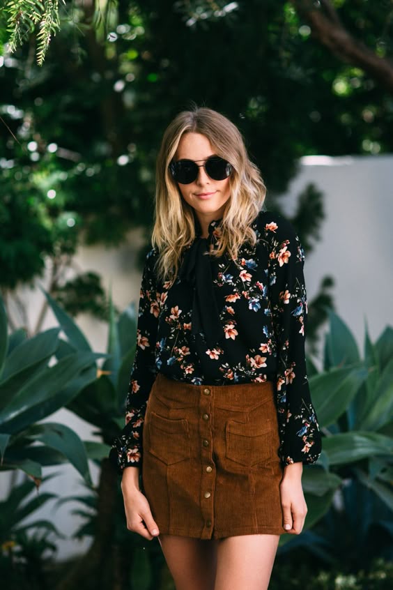 Mysterious, dark florals are always on Amelia's mind! This textured crepe blouse features a self-tie neck and bishop sleeves. We paired it with our Dream Stretch Denim and Braided Heels in Black. Model is wearing size small.