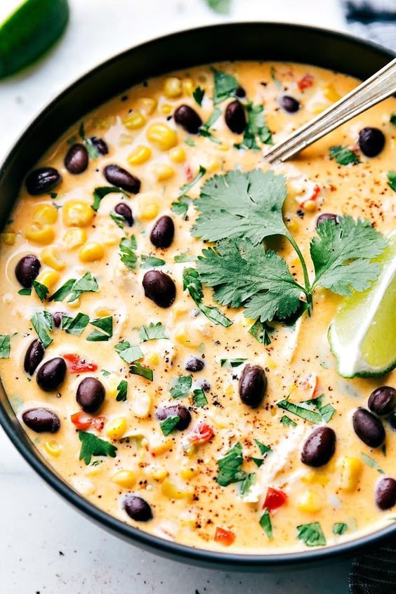 Dump it and forget about it slow cooker meal! A delicious Mexican crockpot corn and chicken chowder that has the same delicious flavors of Mexican Street Corn! I chelseasmessyapron.com