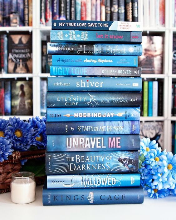 Blue Book Tower. #MarchBookstagram --- Happy Saturday Bookworms!! I hope you're having an awesome day so far. I've spent the morning cleaning up my bookshelves which was desperately needed and soon I'm heading to the hardware store to get some supplies for some projects I'll be working on next week. Fun right? --- What are you up today today?? And what are you reading this weekend?? --- #bookphotochallenge #bookstagram #bookstagrammer #bookstagramfeature #bookishfeatures #bluebooks #yabooks #sh