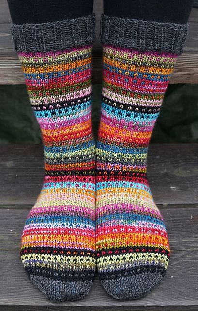 photo inspiration! Uses the Modicum Mitts pattern as inspiration. A Great way to use up odds and ends of sock yarn. Use a basic sock pattern (free in the shop!) and stripe away. Love the grey cuff and toes