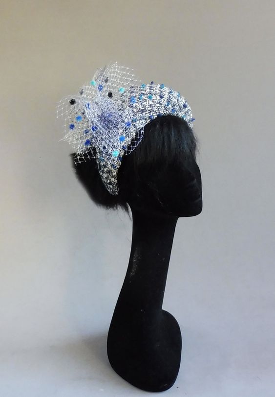 Handmade in Holland multiple shades of blue with off white bouclé fabric halo hat with ton sur ton birdcage veiling fabric