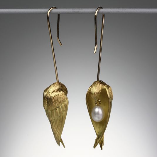 A pair of 18K yellow gold sleeping birds with small white pearls, measuring approximately 1 7/8".