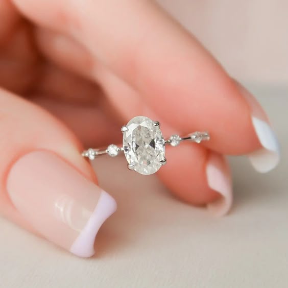 2.5 CT Oval Moissanite Engagement Ring Oval Cut Wedding Ring Oval Solitaire Ring Oval Bridal Ring Anniversary Gift Promise Ring Gift for Her The stones in jewelry are 100% hand-crafted it is cut and polished by our experienced craftsman. Moissanite is the diamond\'s best alternative. Metal: - 925 Sterling Silver / 10k / 14k (can be made in yellow/rose/white gold) Center Stone: Lab Diamond/Moissanite Stone Shape: Oval Cut Weight: 2.5 CT / 7*10 mm Color: D-F Clarity: VVS1 Side Stones: Lab Diamond S