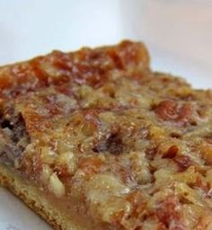 1 can crescent rolls 3/4 cup chopped pecans 1/2 cup sugar 1/2 cup corn syrup 2 T butter, melted 1 t vanilla 1 egg , beaten Heat ov...