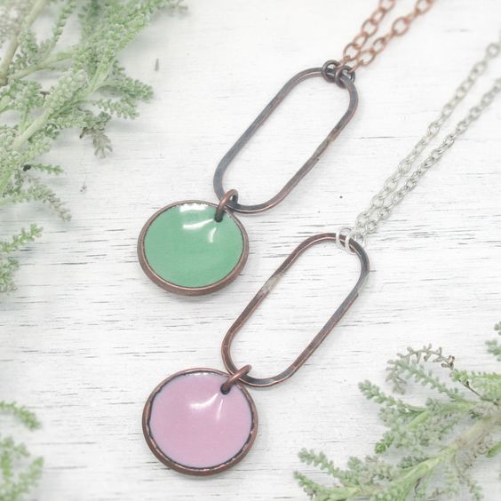 Necklace with enameled penny suspended on a blackened copper oval on the chain. The chain length is adjustable from 16 to 18"Pendant measures 2"Penny jewelry is a great copper anniversary gift.Many buy my enamel penny jewelry as a "pennies from heaven" gift, to remember a loved one.You can order these with a custom date (between 1940 and 1982) buy adding this custom date upgrade here