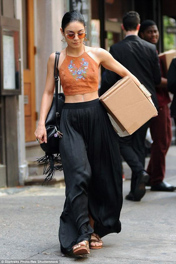Boho style: Vanessa Hudgens certainly channeled her hippy self and showed off a serious amount of skin as she stepped out in the city in a sexy two-piece outfit on Thursday