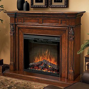 The Dimplex Torchiere Burnished Walnut Electric Fireplace Mantel Sets The Standard For R Electric Fireplace With Mantel Fireplace Accessories Fireplace Remodel