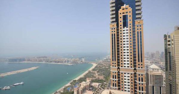 Dubai S Most Pricey Building And Its Second Tallest Structure After The Burj Khalifa The Princess T Courtesy Building World Famous Buildings Dubai Hotel