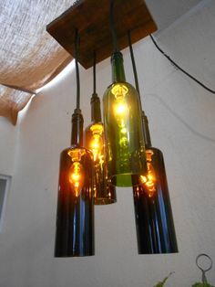 Lampara Colgante Con Botellas De Vino Buscar Con Google Lámparas De Botellas De Vino Ideas Botellas De Vidrio Reciclaje Botellas De Vidrio