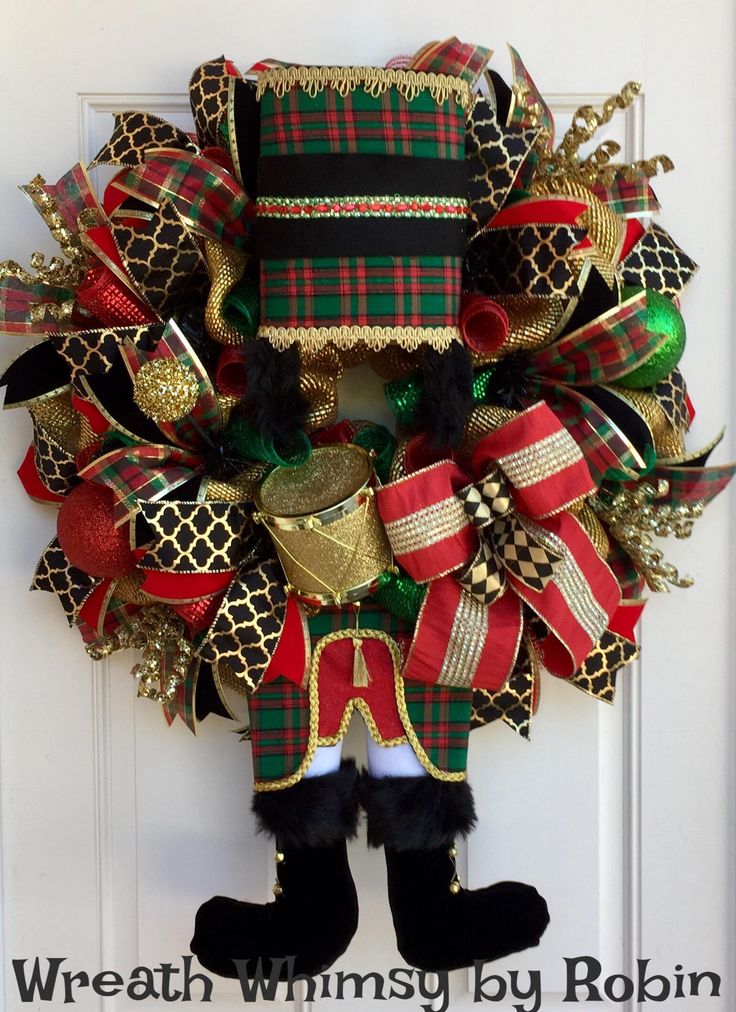 holiday deco mesh nutcracker wreath is red green gold character christmas