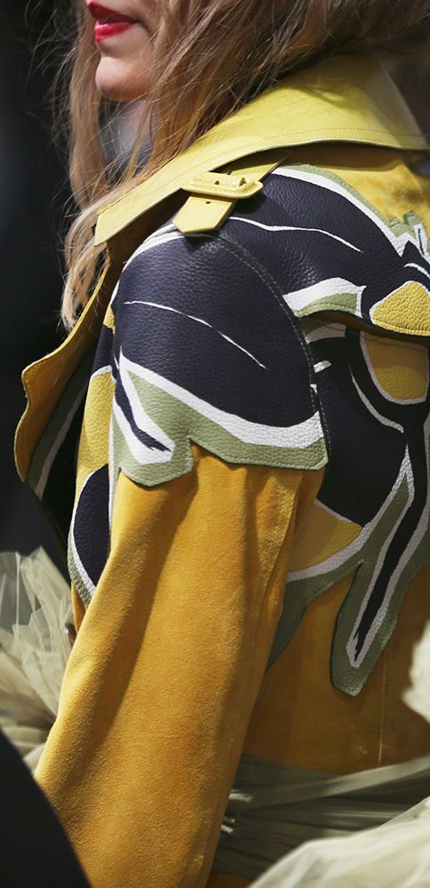 A trench coat decorated with a bold bee motif | Fashion, Women wear