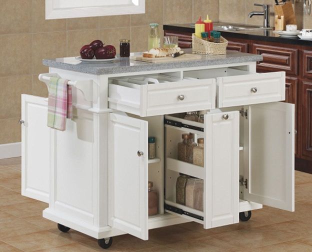 a white kitchen island with two drawers on wheels