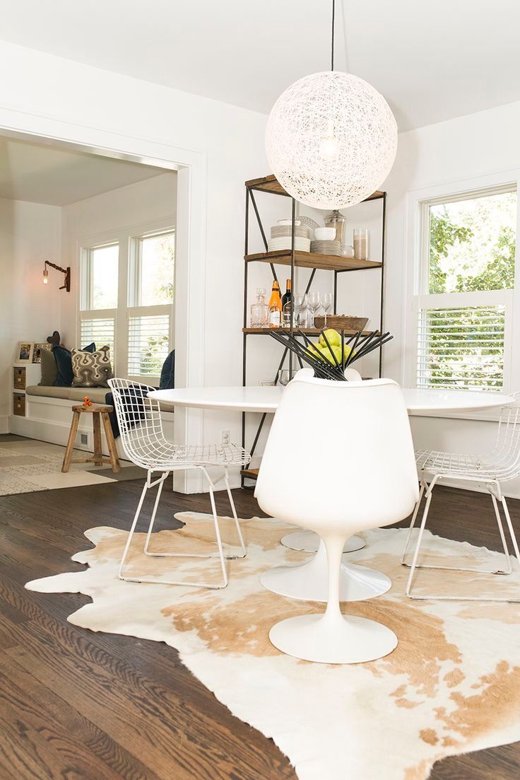 Pin By Amanda Olsson Interiors On 3775 Roberta Cowhide Rug Dining Room White Dining Table Round Dining Table Modern