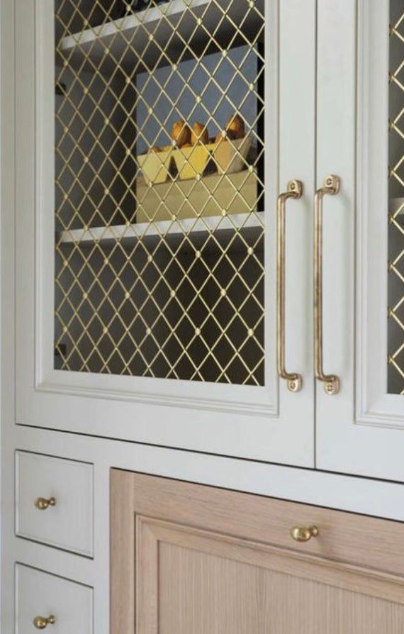 Brass Architectural Woven Wire Mesh Satin Furniture And Creative Grille In 2021 Timeless Interiors Kitchen Cabinetry Luxury Interior Design Brass Architectural Woven Wire Mesh, Brass Grilles For Cabinets