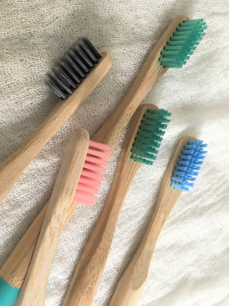 4 Amazing Bamboo Toothbrushes And Charcoal Floss In 2021 Bamboo Toothbrush Brushing Teeth Biodegradable Products