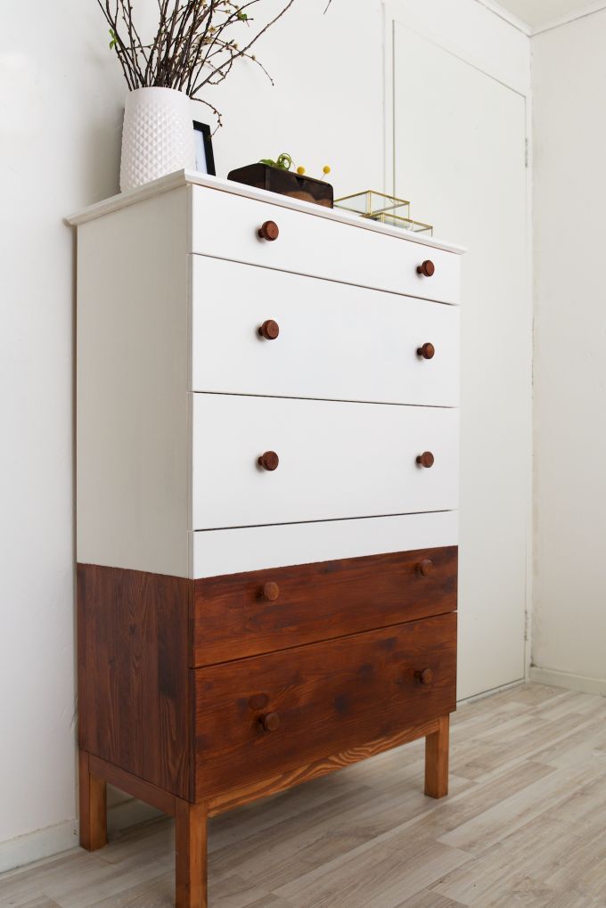 This restyled cabinet on top of a cabinet provides a unique mid-century look.