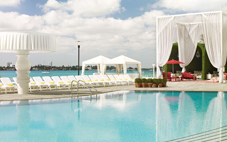 Mondrian South Beach | You don’t need to be a guest to take advantage of these amazing rooftop pools. Whether you slip in undetected, pay a fee, book a spa appointment, or order a round of drinks, you can spend your day sunbathing by some sweet swimming holes across the country.