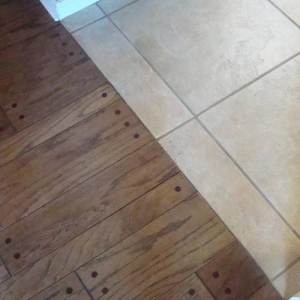 I want the hardwood to meet the tile hearth without wood ...