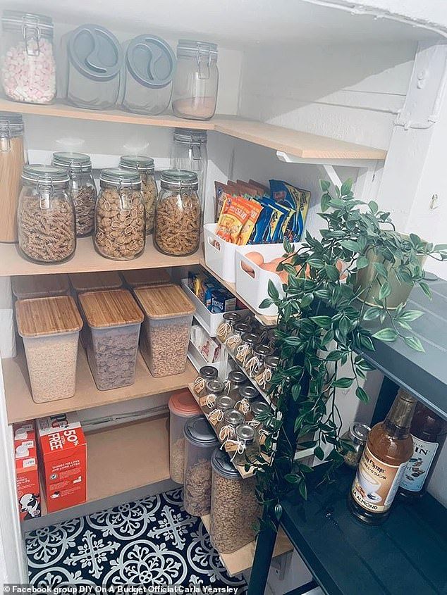 Woman transforms empty cupboard into Woman transforms cabinet into storage