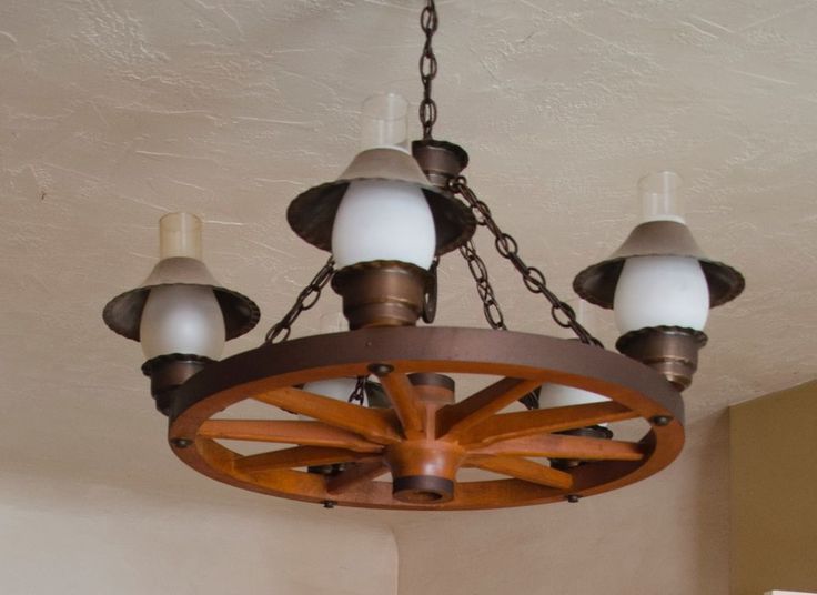 199 Best Rock Me Mama Like A Wagon Wheel Images On Vintage Wagon Wheel Chandelier Lamp With Horseshoe